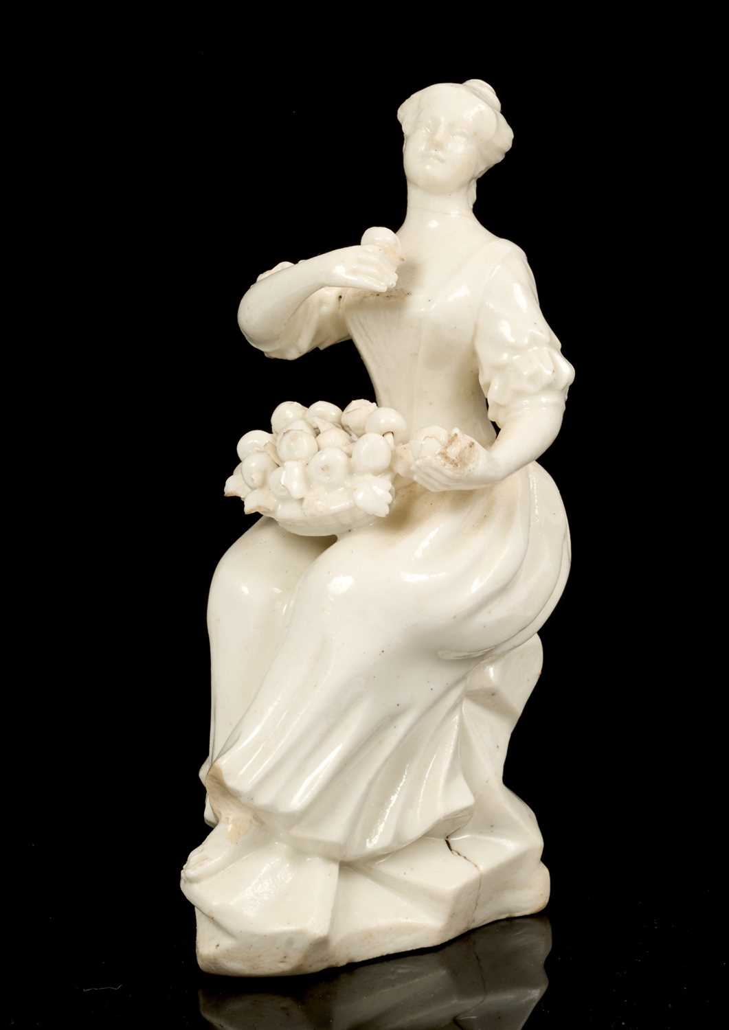 Lot 19 - 18th century white glazed porcelain figure of a woman