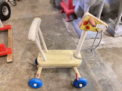 Lot 281 - Vintage wooden rocking horse together with a Chad Valley push a long (2)