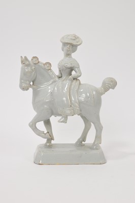 Lot 32 - 18th century Dutch Delft figure of a lady on horseback