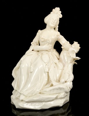 Lot 17 - 18th century  porcelain figure of a seated lady