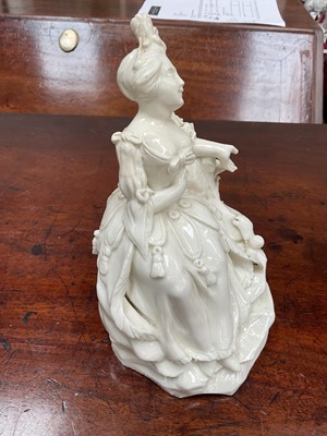 Lot 17 - 18th century  porcelain figure of a seated lady