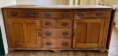 Lot 1214 - Antique pine dresser base with an arrangement of cupboards and drawers, inset marble panel to top and a folding end panel (to stop the dog getting into the kitchen)