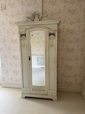 Lot 1337 - Art Nouveau inspired painted wardrobe with pierced and embossed decoration and central mirror