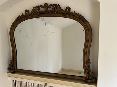 Lot 1277 - Victorian gilt framed overmantel mirror of shaped form with carved scroll cresting