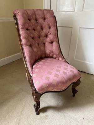 Lot 1269 - Victorian nursing chair with carved mahogany scroll frame and buttoned upholstery