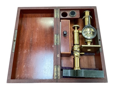 Lot 2507 - Good quality brass microscope in fitted wooden case
