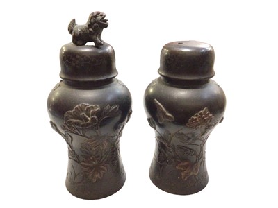 Lot 318 - Pair of Chinese bronze miniature vases and covers