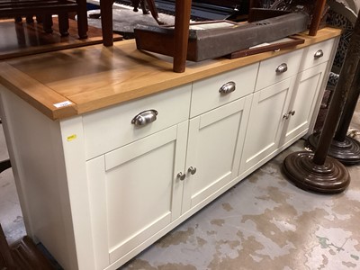 Lot 1226 - Large contemporary light oak and cream sideboard with four drawers and cupboards below, 188.5cm wide, 45cm deep, 76.5cm high