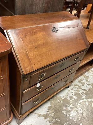 Lot 1385 - Early 18th century fruitwood bureau, fitted with three long drawers and a central cupboard, with classical columns surrounded by six pigeon holes and eight small drawers, 3 ft wide x 3ft 10” high x...