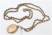 Lot 3262 - Victorian yellow metal chain with locket