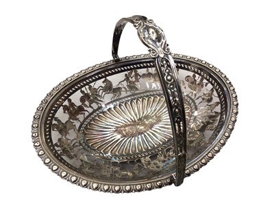 Lot 335 - Silver plated bread basket with pierced and engraved decoration depicting Roman soldiers