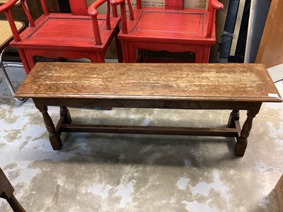 Lot 1256 - Long oak stool on turned and block legs joined by stretchers, 121cm wide, 31.5cm deep, 44cm high