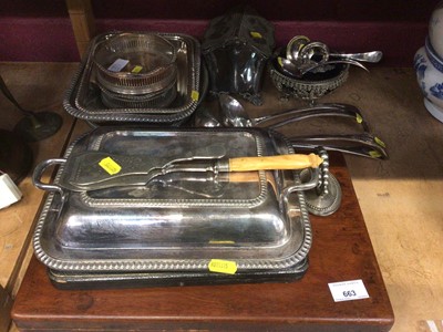 Lot 663 - Three silver plated entree dishes (two with cast handles), three ladles and one large basting spoon, waffle/sandwich holder, pair small ladles, par antique style coasters, Victorian twin flap biscu...