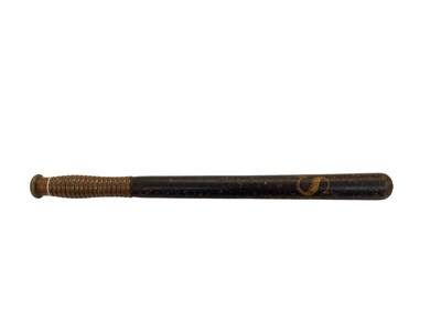 Lot 372 - 19th century black painted turned wood Police truncheon with gilt lettering 'C S', with ribbed grip, marked H&L Born, 37.5cm in length.