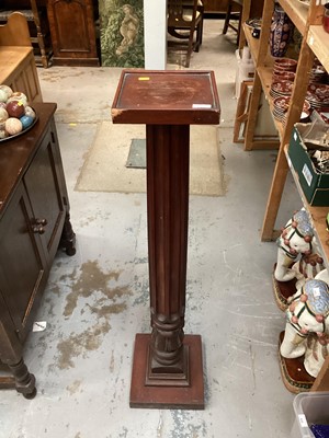 Lot 1331 - Mahogany torchere with fluted column