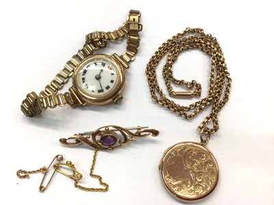 Lot 1024 - Edwardian 9ct gold gem set brooch, 9ct gold locket on chain and 9ct gold cased vintage wristwatch on plated bracelet