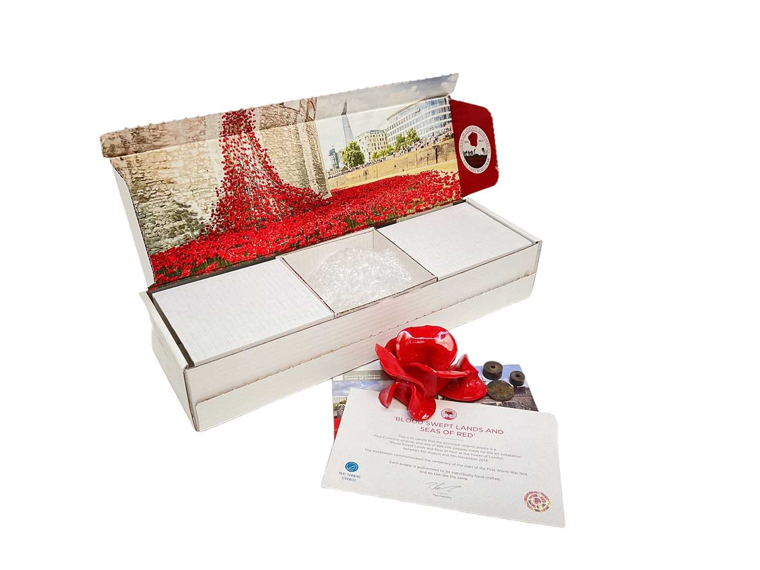 Lot 723 - Paul Cummins Tower of London ceramic poppy, one of 888,246 placed outside the Tower of London in 2014 to marks the centenary of the First World War, in original box with paperwork.