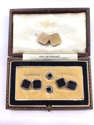 Lot 1039 - Pair of 9ct white gold and black enamel cufflinks and matching pair of studs and one other 9ct gold cufflink