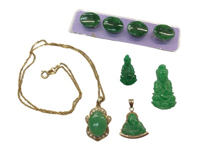 Lot 1042 - 18ct gold mounted green hardstone pendant on 18ct gold chain, one other similar 18ct gold mounted Buddha pendant and other pieces of green hardstone