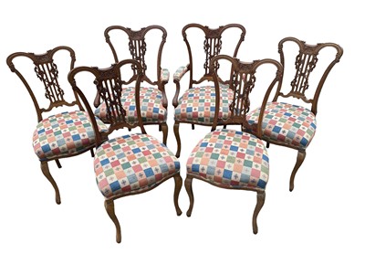 Lot 1241 - Set of six Edwardian carved walnut salon chairs upholstered in Romo fabric