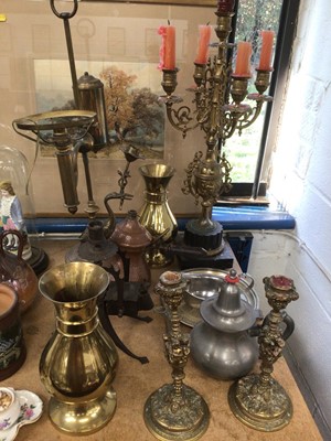 Lot 70 - Group of metalware, including a large Gothic-style brass candelabra and similar pair of candlesticks