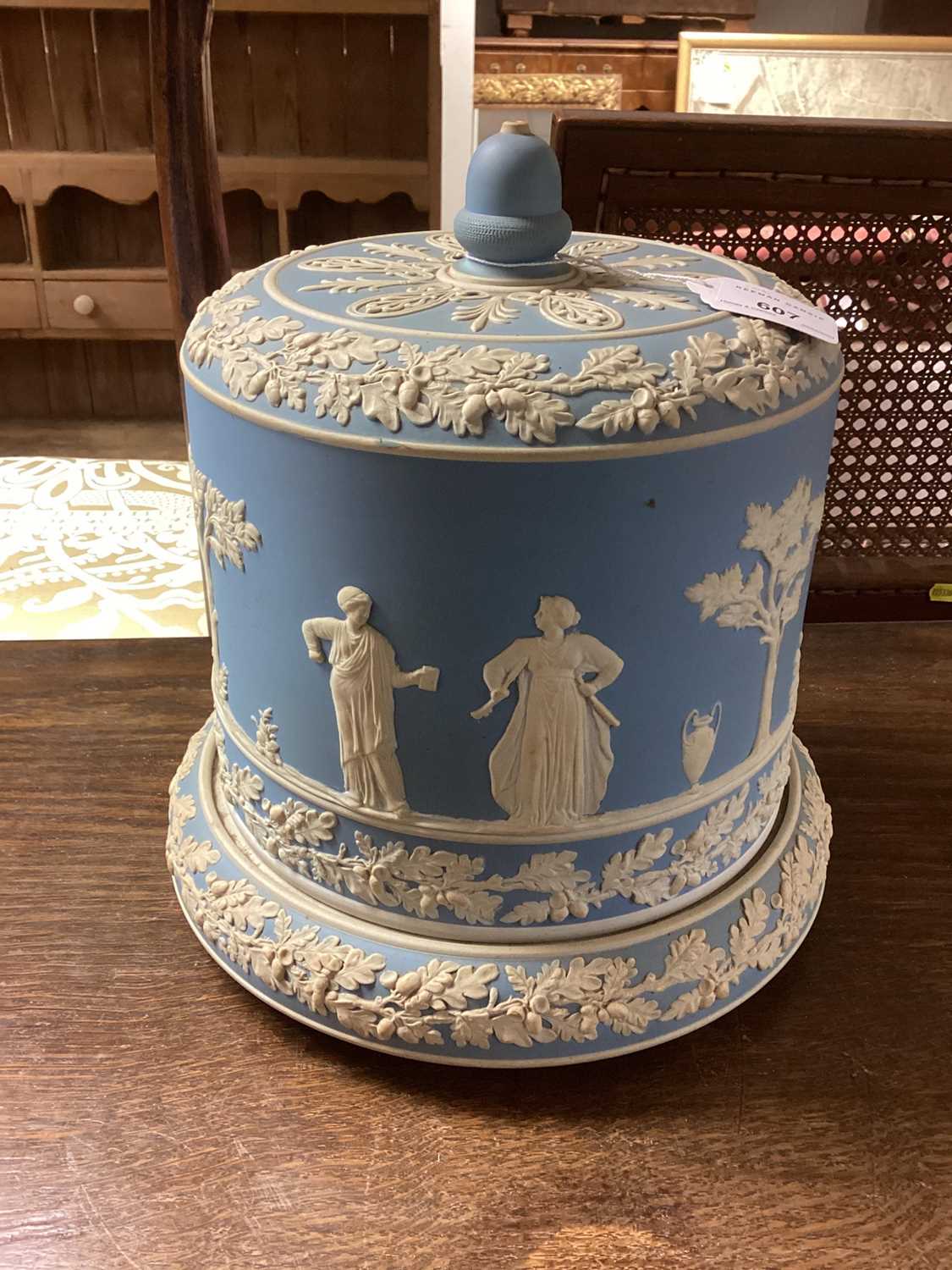 Lot 607 - Victorian blue Jasper Ware cheese dome with classical figure decoration 29cm high