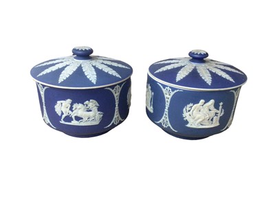 Lot 92 - Pair of Wedgwood dark blue jasperware covered bowls, decorated with classical scenes, impressed marks, 13.5cm diameter
