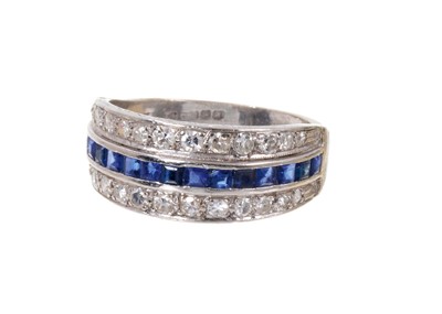 Lot 517 - Sapphire and diamond eternity ring