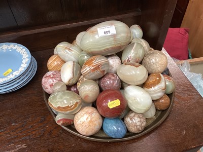 Lot 609 - Collection of polished onyx and marble eggs and balls