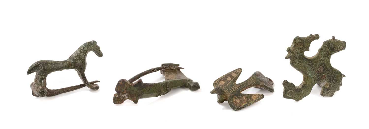 Lot 777 - Four Roman brooches
