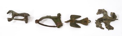 Lot 777 - Four Roman brooches