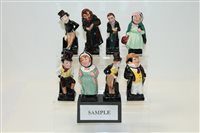 Lot 2101 - Twenty-three Royal Doulton Dickens figures -...