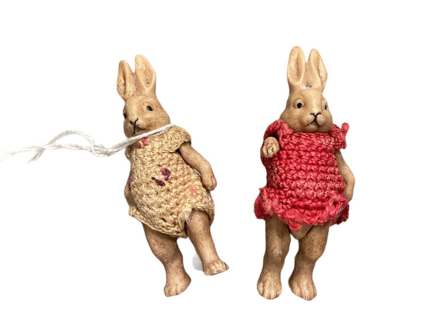 Lot 1916 - Two Hertwig bisque Rabbits in crochet dress,