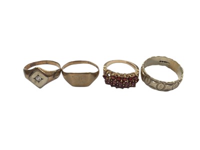 Lot 1058 - Four 9ct gold rings to include two signet rings, garent cluster and a white gold wedding band