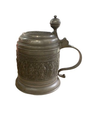 Lot 94 - Large pewter tankard decorated in relief with the twelve apostles