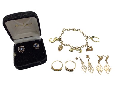 Lot 1064 - Two 9ct gold gem set rings, pair 9ct gold sapphire studs earrings, two other pairs of yellow metal earrings and a gold (333) charm bracelet