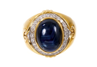 Lot 498 - Sapphire and diamond ring