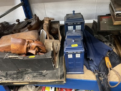 Lot 222 - Selection of umbrellas and walking sticks, box of treen including oriental figures plus two trays, selection of pictures and prints plus oval wall mirror, and three vintage plastic 'Doctor Who' Tar...