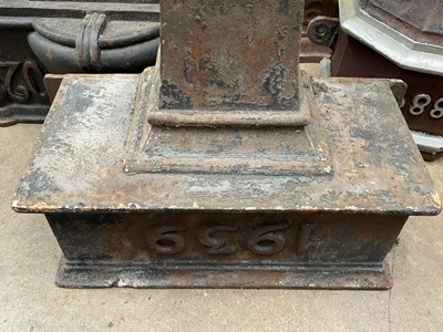 Lot 190 - Four cast iron dated water hoppers