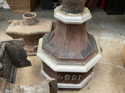 Lot 190 - Four cast iron dated water hoppers