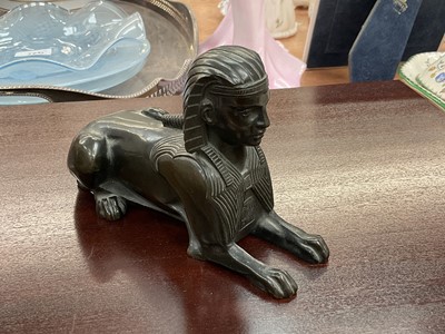 Lot 437 - Hollow cast bronze model of a Sphinx, possibly from a clock