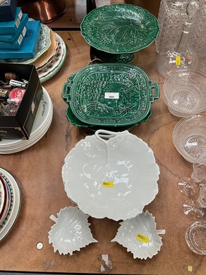 Lot 460 - Group of Wedgwood and other 19th green majolica leaf plates, together with four contemporary Limoges white porcelain leaf dishes.