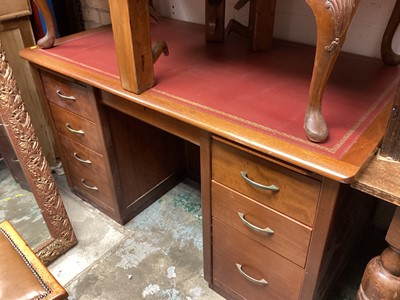 Lot 1397 - Mid century kneehole desk with inset leather lined top and eight drawers below, 138cm wide, 77cm deep, 78cm high