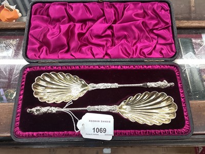 Lot 1069 - Pair of Victorian silver apostle serving spoons in fitted case