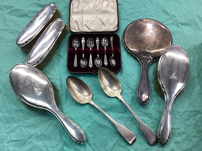 Lot 1111 - Two Georgian silver table spoons, set of six silver coffee spoons in fitted case and group of silver backed brushes