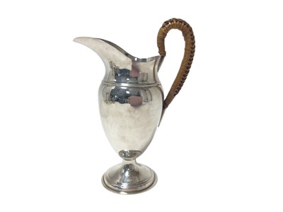 Lot 268 - Edwardian silver hot water jug with wicker covered handle