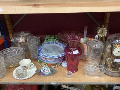 Lot 648 - Lot decorative china, glassware, perpetual motion mantel clocks and sundries ( 3 shelves)