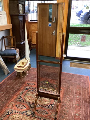 Lot 1427 - Walnut veneered cheval mirror on splayed legs, 163cm high