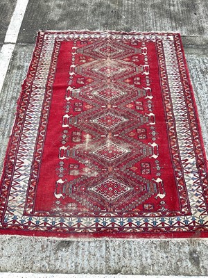 Lot 1439 - Eastern rug with six central medallions on red and cream ground, 167cm x 123cm