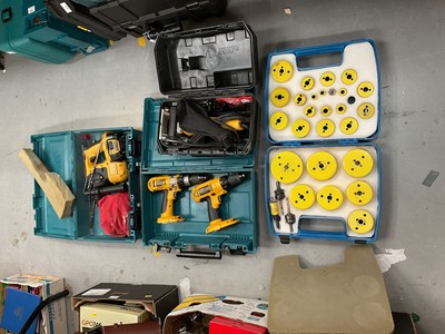 Lot 479 - Two DeWalt drills (minus batteries) together with another DeWalt drill, a DW682 and a box of fittings.